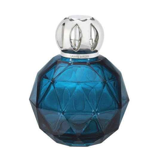 Blue geometric glass bottle with a silver top.