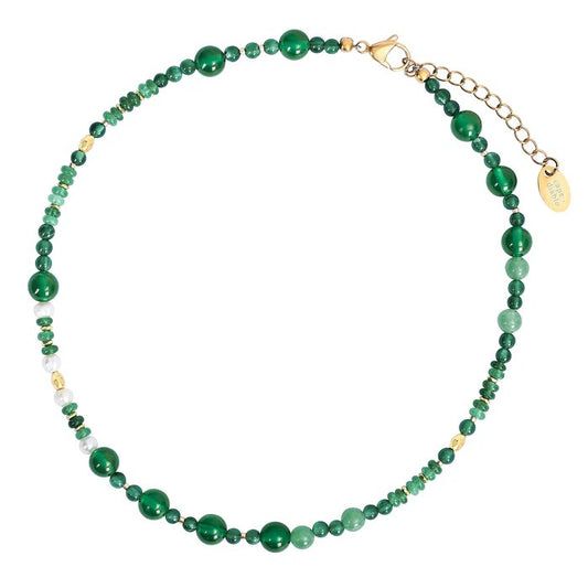 Elegant green beaded necklace with gold clasp and extender.