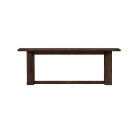 A long, dark wooden table with a minimalist design.