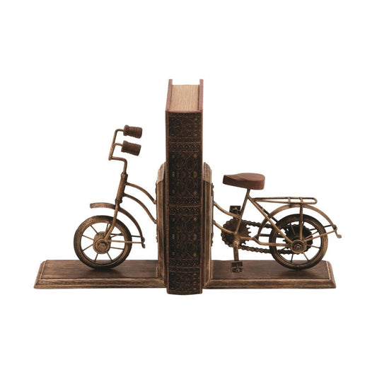 Vintage bicycle bookends holding a book upright.