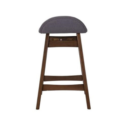 Wooden stool with a curved, upholstered seat in gray.