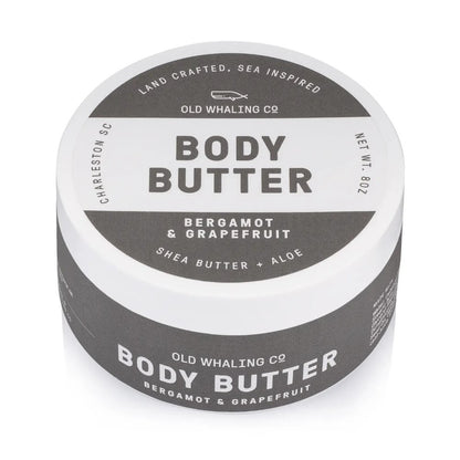 Round container of Old Whaling Co. Body Butter, bergamot & grapefruit.