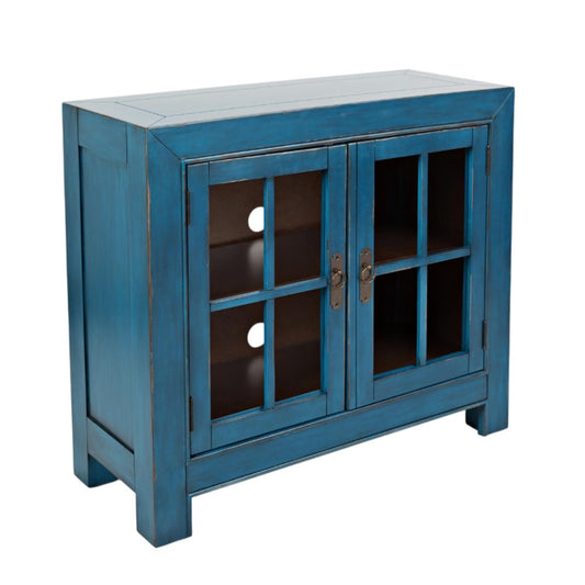 Blue wooden cabinet with glass paneled doors and metal handles.
