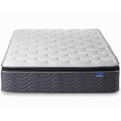 Gray and white quilted mattress with textured fabric design.
