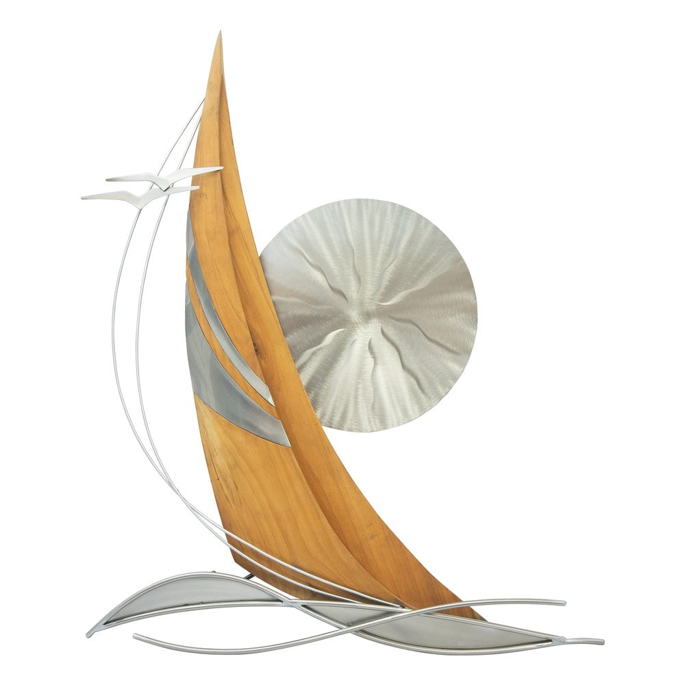 Modern sailboat sculpture with seagulls and a circular background.