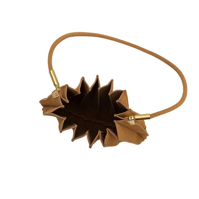 Brown pleated handbag with gold accents.