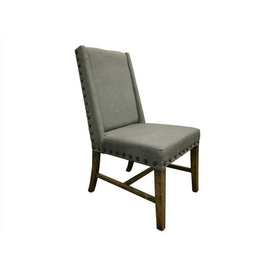 Gray upholstered chair with wooden legs and studded trim.