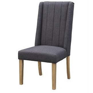 Gray upholstered chair with wooden legs and vertical stitching on the backrest.