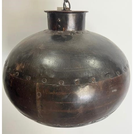Rusty vintage industrial metal pendant light fixture.