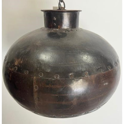 Rusty vintage industrial metal pendant light fixture.