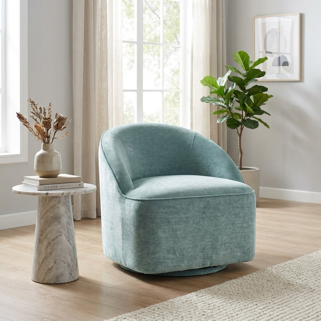Light blue upholstered swivel chair with a rounded design.