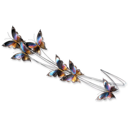 Vibrant metal butterflies on curved wires, showcasing colorful wings in gradient hues.