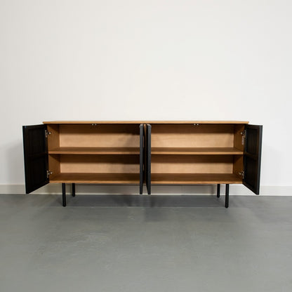 Wooden cabinet with black doors open, showing empty shelves inside.