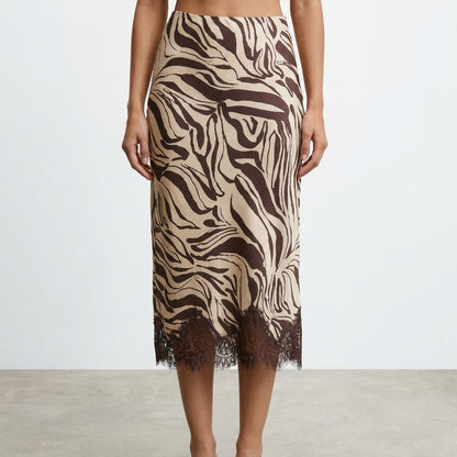 Brown zebra-print skirt with lace hem detailing.