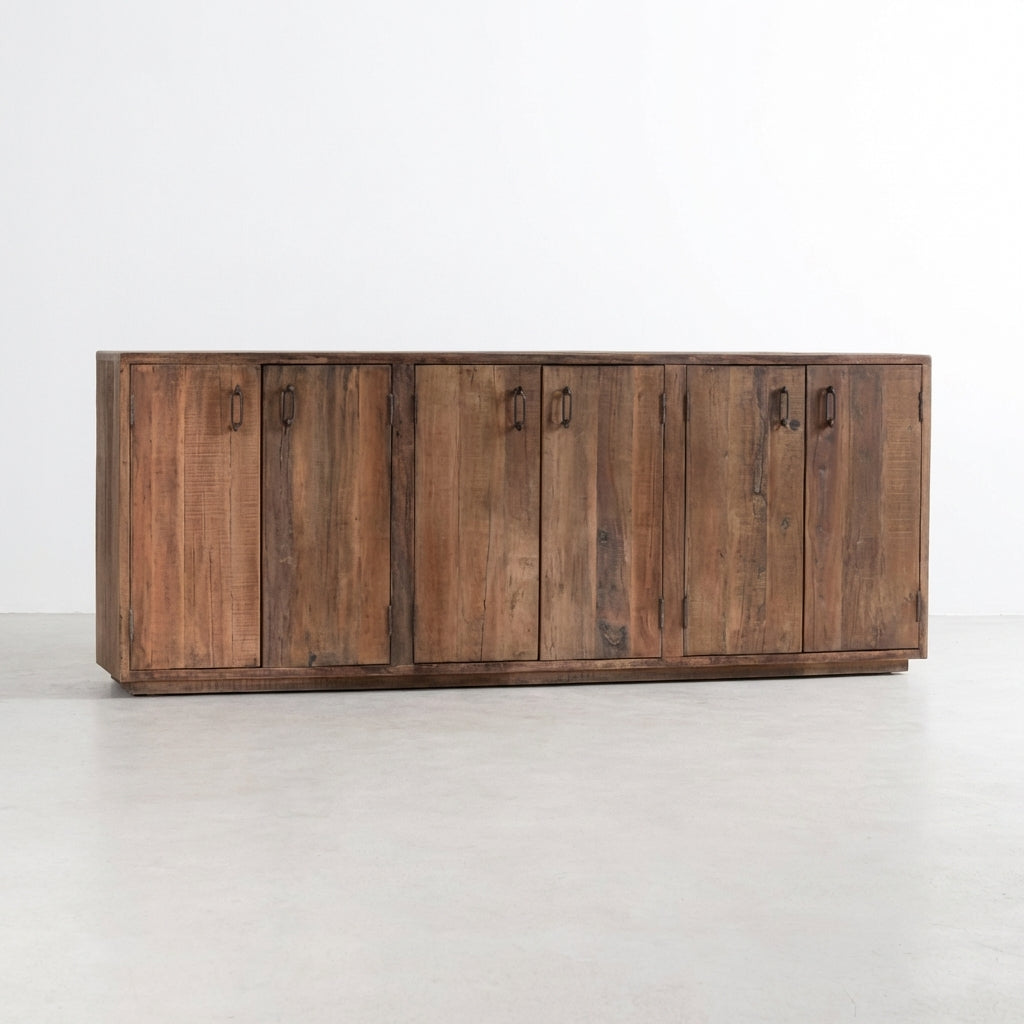Wooden sideboard with open shelves in the middle and closed cabinets on each side.