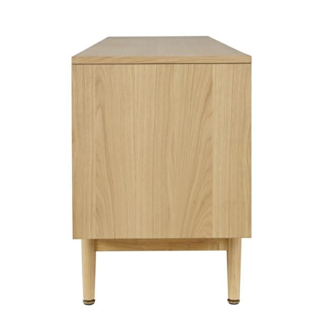Wooden cabinet viewed from the side, on minimalist legs.