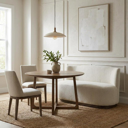 Minimalist beige loveseat on a gray floor.