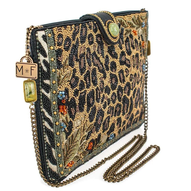 Beaded animal print clutch with chain strap and intricate details.