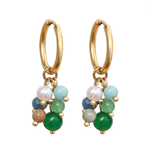 Gold hoop earrings with colorful beaded charms.