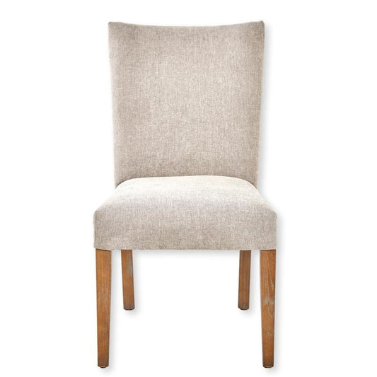 Beige upholstered chair with wooden legs.