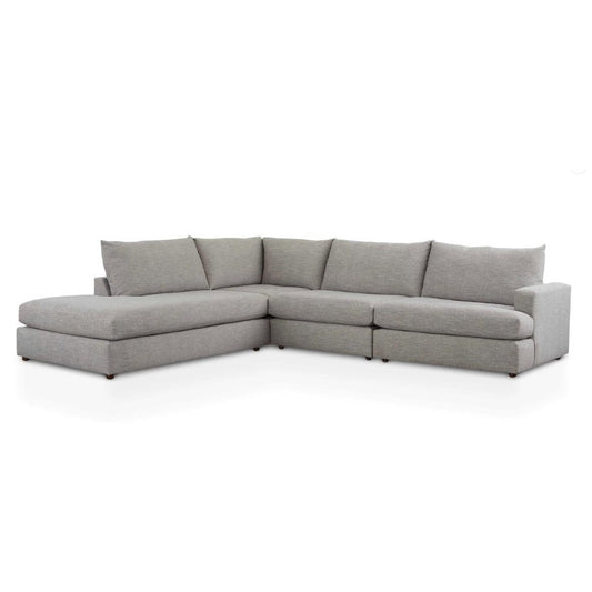 Gray sectional sofa with chaise, modern and spacious.
