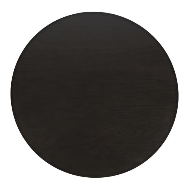 A round, dark wooden tabletop viewed from above.