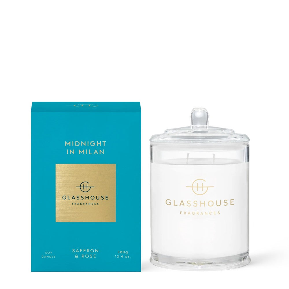 Turquoise candle box and clear jar labeled "Glasshouse Fragrances: Midnight in Milan."
