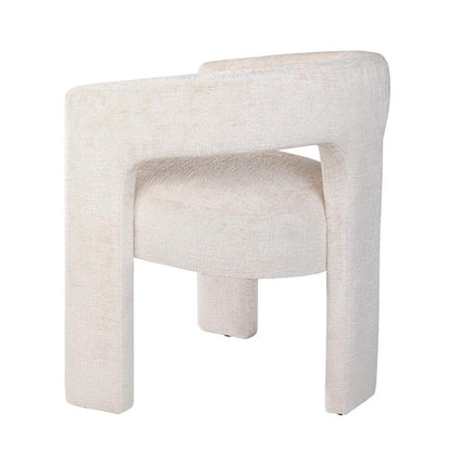 Modern beige upholstered chair with curved back.