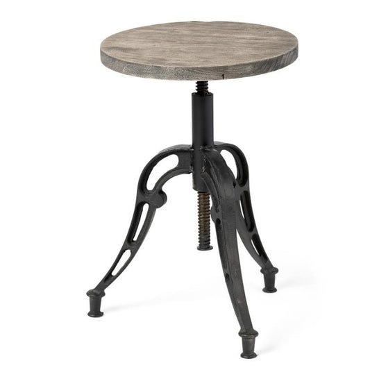 Industrial-style stool with a round wooden seat and metal adjustable base.