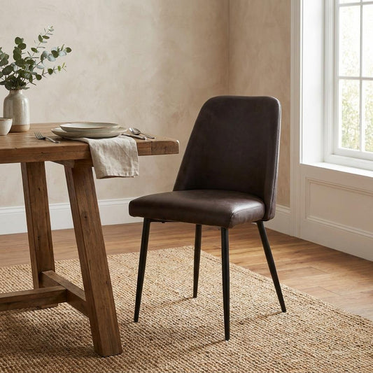 Dark brown leather chair with black metal legs.