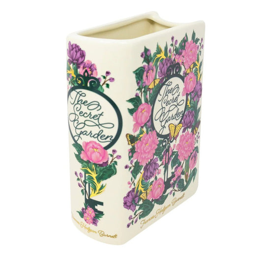 Book-shaped vase with floral design and "The Secret Garden" text.