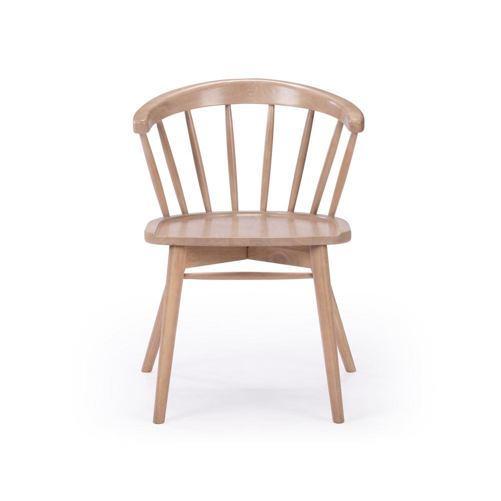 Wooden chair with a curved back and vertical slats.