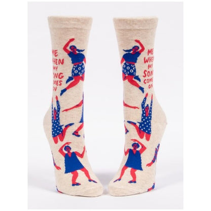 Colorful crew socks with dancing figures and playful text graphics.