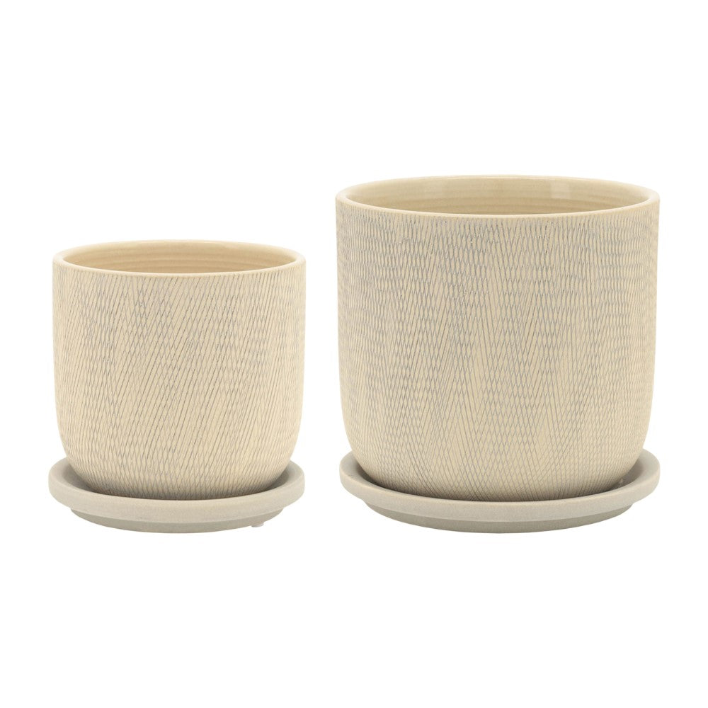 Two textured beige pots with saucers, one smaller than the other.