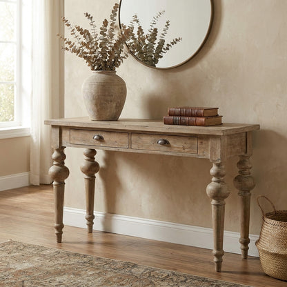 Wooden console table with two drawers and turned legs.