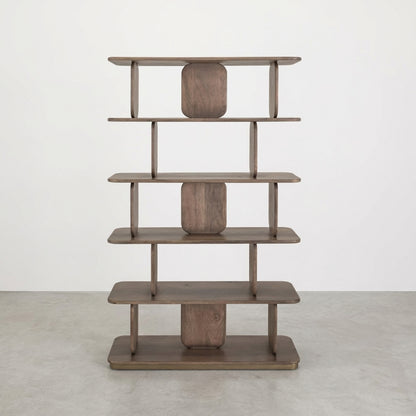 Modern wooden bookshelf with five staggered shelves.