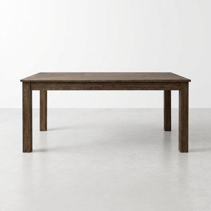 Simple wooden table in an empty room, minimalistic design.