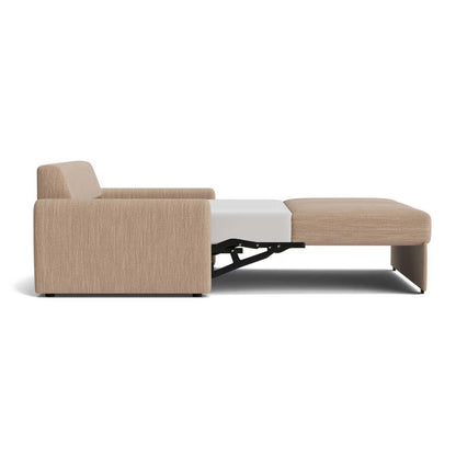 Beige upholstered sofa viewed from the back.