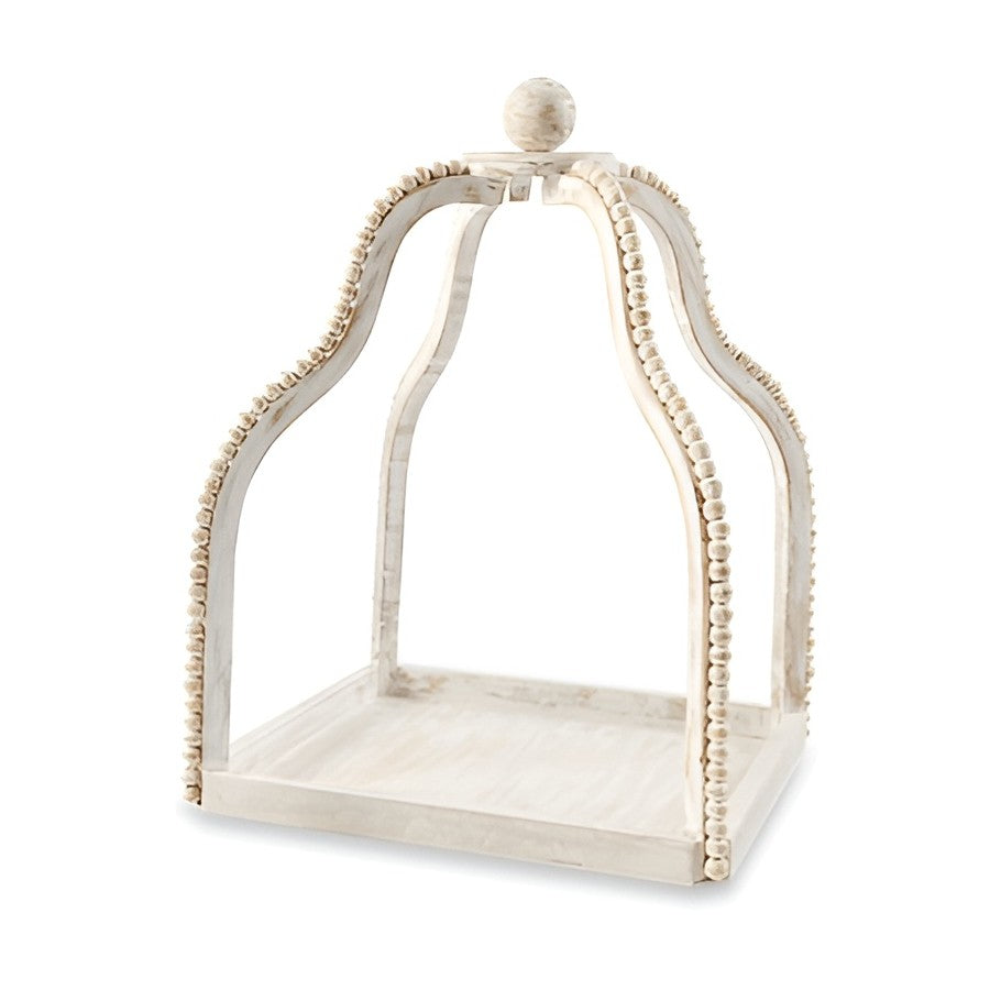 Wooden decorative frame with beaded edges and a dome shape.