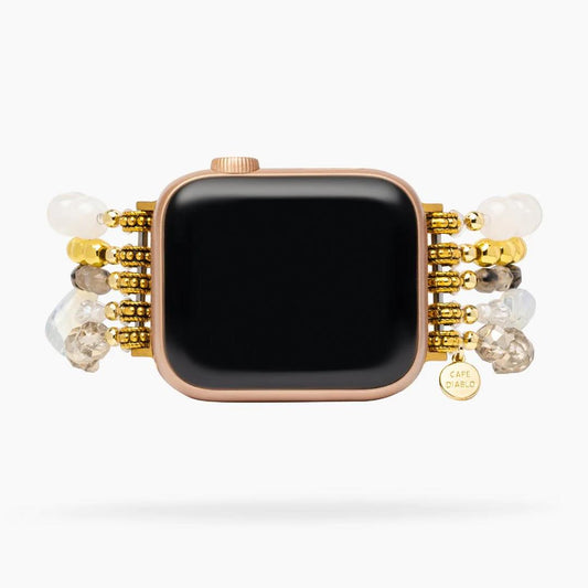 Smartwatch with a beaded, gold-accented strap.