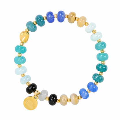 Colorful beaded bracelet with gold accents and an engraved charm.