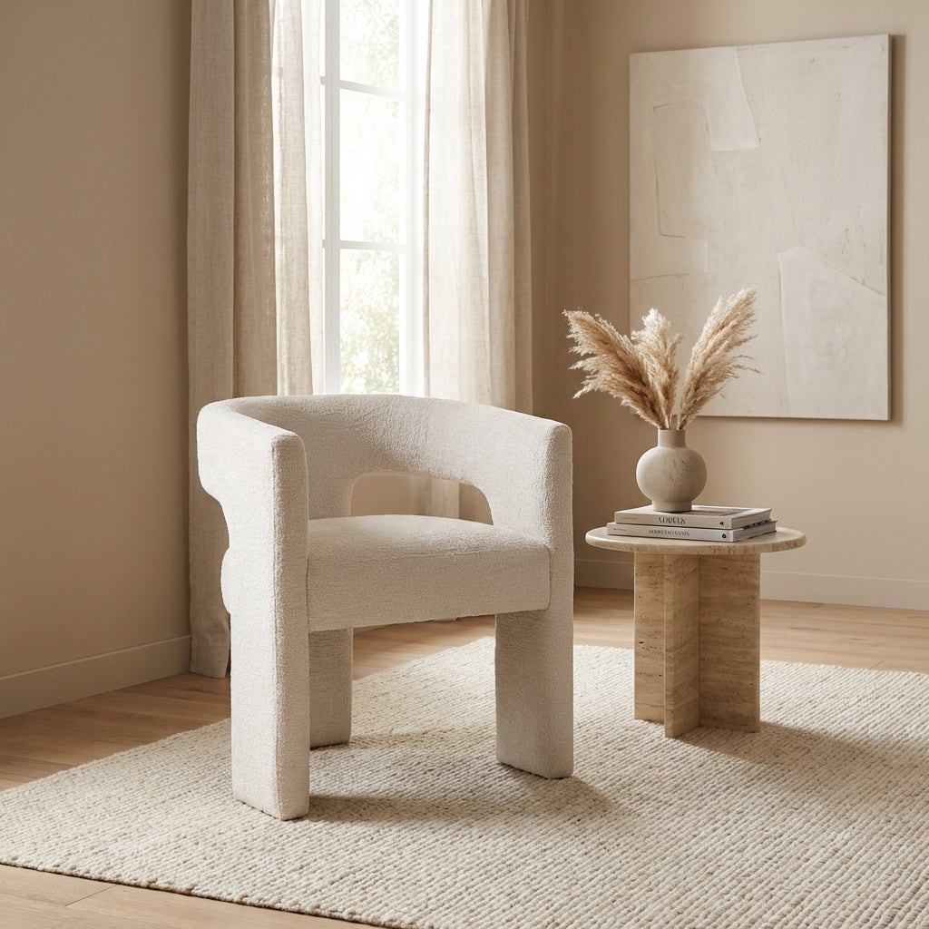 Modern white textured chair with a curved back and single central leg.