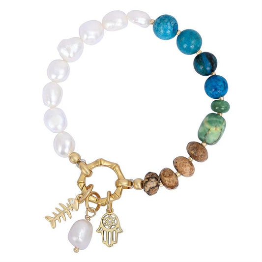 Beaded bracelet with blue, pearl stones, and gold charms.
