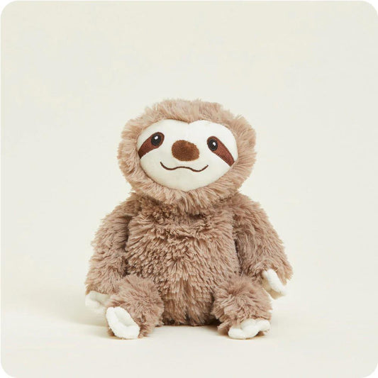 Plush toy sloth with fluffy fur and a friendly smile.