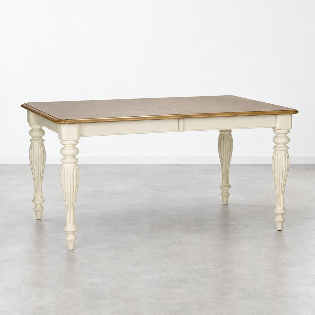 Wooden table with ornate white legs and a natural finish top.