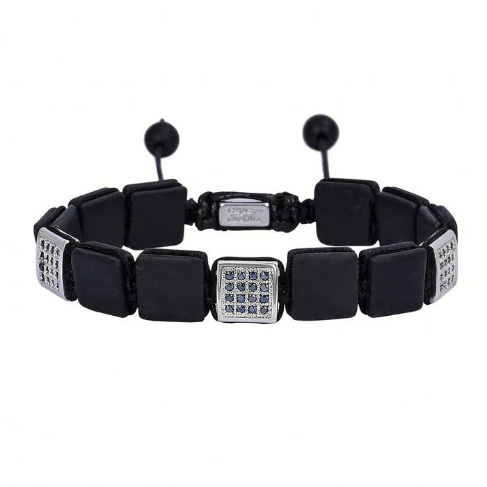 Black square-link bracelet with silver accents and gemstones.