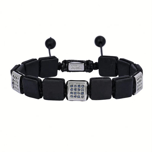 Black square-link bracelet with silver accents and gemstones.
