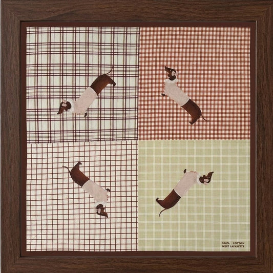 Plaid squares with dachshunds in a framed pattern.