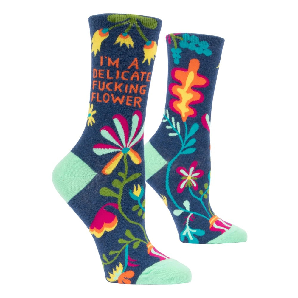 Colorful socks with floral patterns and bold text.