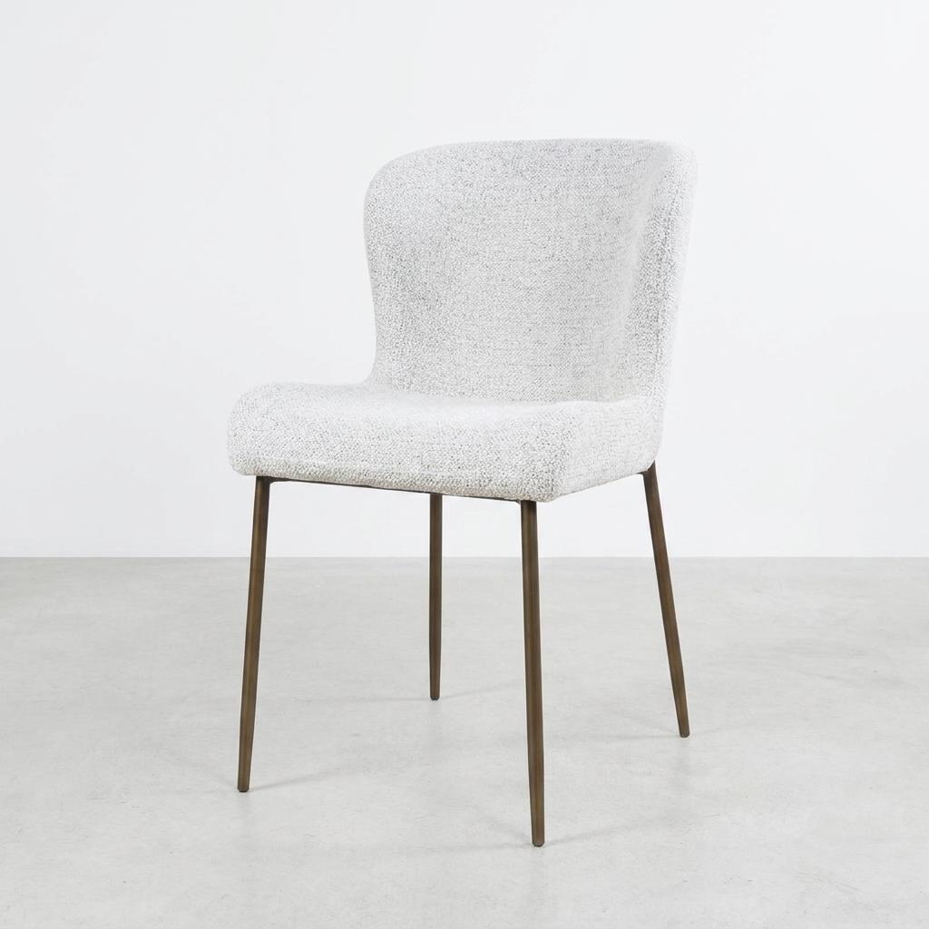 Modern white chair with metal legs against a plain background.